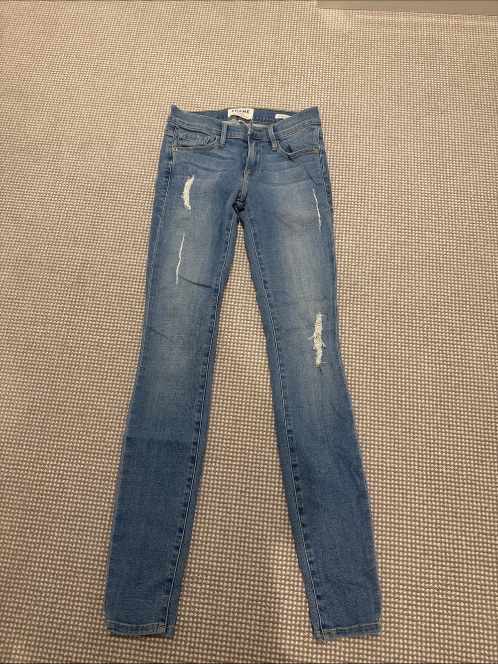 Frame Denim Skinny Jeans in Faded Blue with Distress